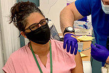Dr. Mona Hanna-Attisha receiving vaccine